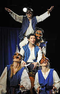 Faction of Fools Commedia Romeo & Juliet: Queen Mab 12 The 2012 cast in blue vests, all in masks except Romeo, form the Queen Mab visual: Benvolio on top with arms outstretched, Mercutio speaking over Romeo's shoulder, two servants at the bottom.