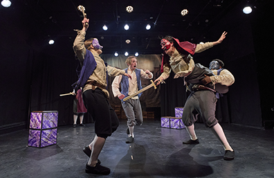 Faction of Foos Commedia Romeo and Juliet: Fight Tybalt, lifted in the air being held by Benvolio at his waist, sword fights with Mercutio, as Romeo runs towrd them. Marbelated segments of the chest stacked as part of the set.